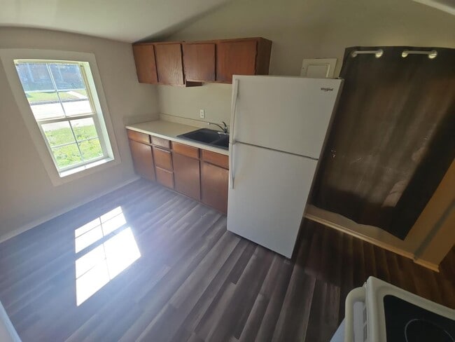 Photo - Cozy 2-Bedroom Home with Large Yard & Stor...
