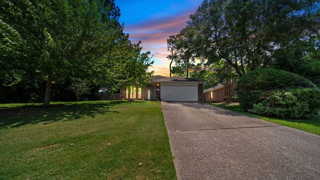 Building Photo - Move-In Ready Montgomery Home with Fenced Yard & Mature Trees!