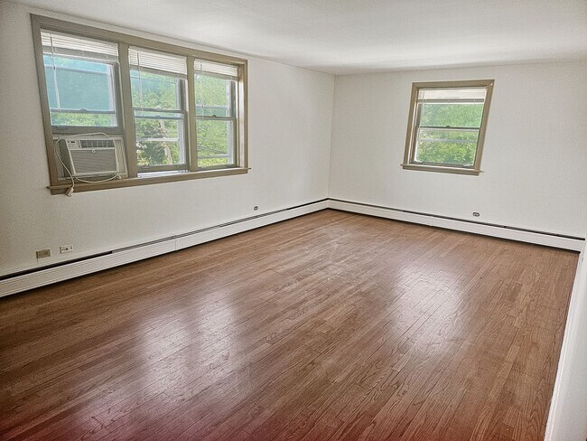 Photo - Mid-Century Modern 1-Bed + Den with Exposed Brick Unit 2727-2N
