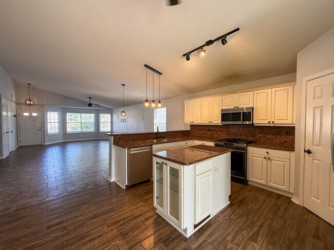 Photo - Charming 3 Bedroom Home with Pergola, Fenced Backyard & Washer/Dryer Included!