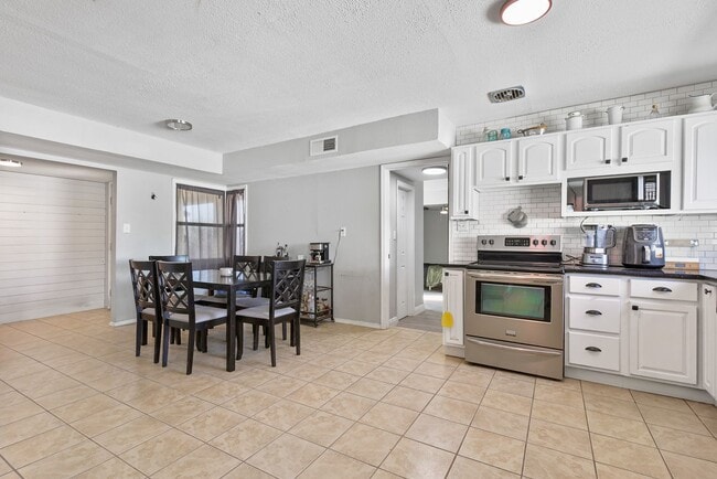 Photo - Roomy 3 Bedroom Home with a Fireplace