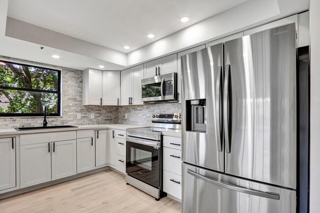 Photo - 700 Uno Lago Dr Unit 301