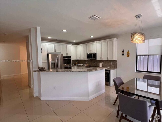 Building Photo - 8744 NW 99th Path Rental