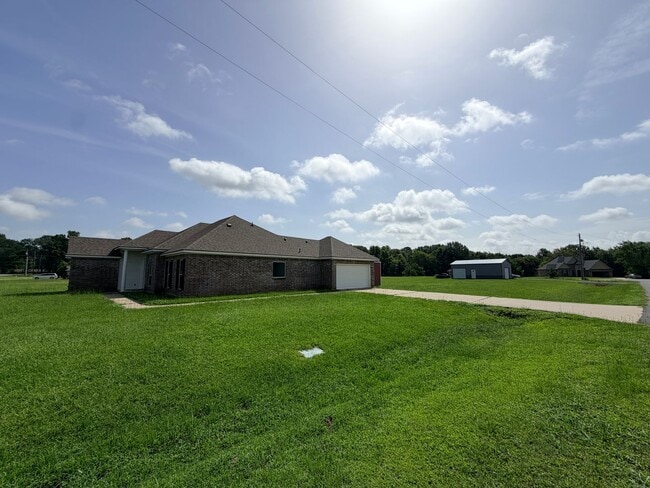 Photo - Large lot with Shop for boat or Atvs......