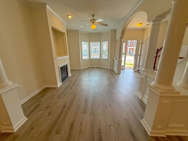 Building Photo - Beautifully updated Townhome! New cabinets, granite counter tops, and LVP flooring through downst...