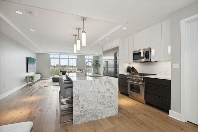 Photo - Elegant 2BR at The Adora | 1,500+ SF, Chef’s Kitchen & Garage Parking!