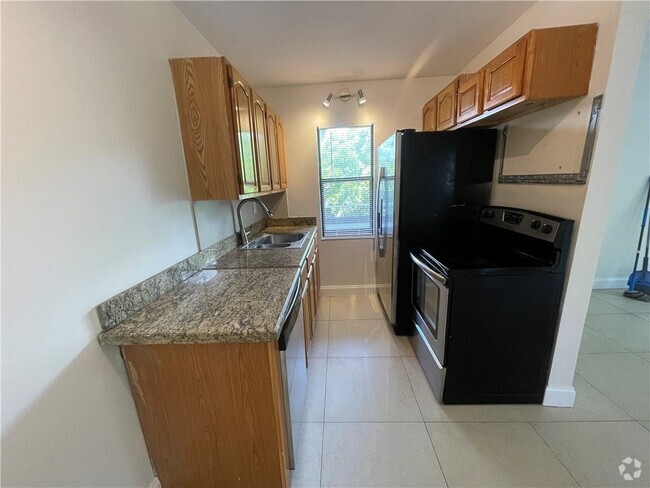 Building Photo - 601 NE 29th Dr Unit 7 Rental