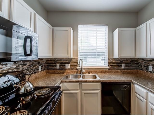 Kitchens With White Cabinets - The Pavilions Apartments