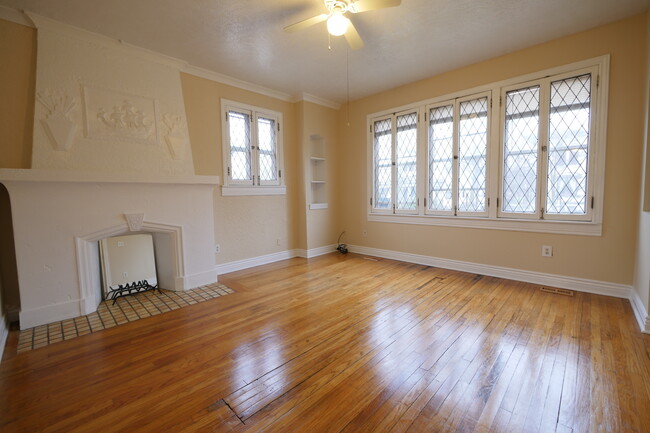 Living Room fireplace lead glass windows - 220 W Walnut St Apartments Unit 4