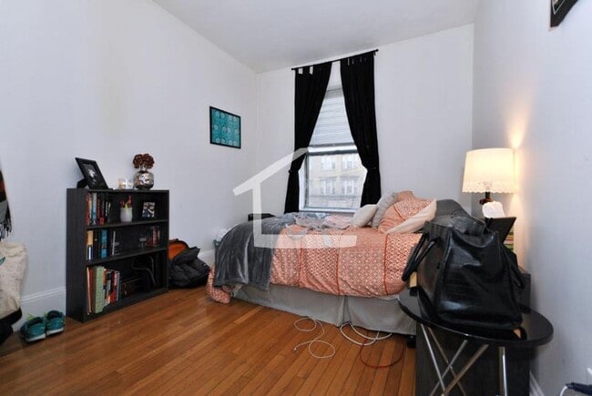 Photo - 4BR 2Bth unit. Great location! On T, walk to supermarket, restaurants.