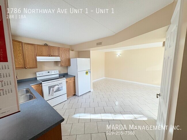 Photo - SPACIOUS 2 BED/1 BATH MODERN LOWER LEVEL SUITE! +HYDRO, GAS & WATER! Unit 1