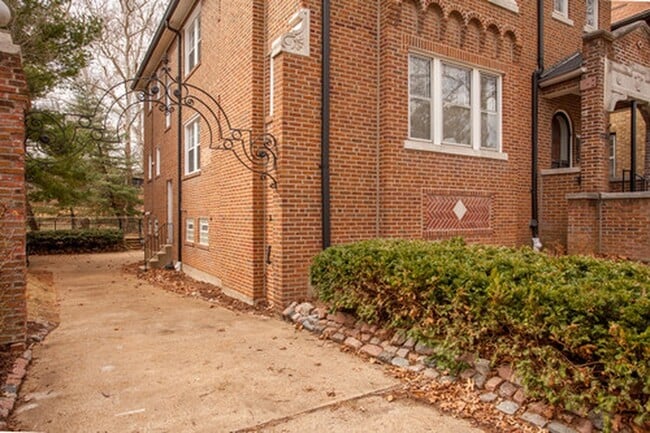 Driveway to garage in rear of building - 7230 Pershing Ave