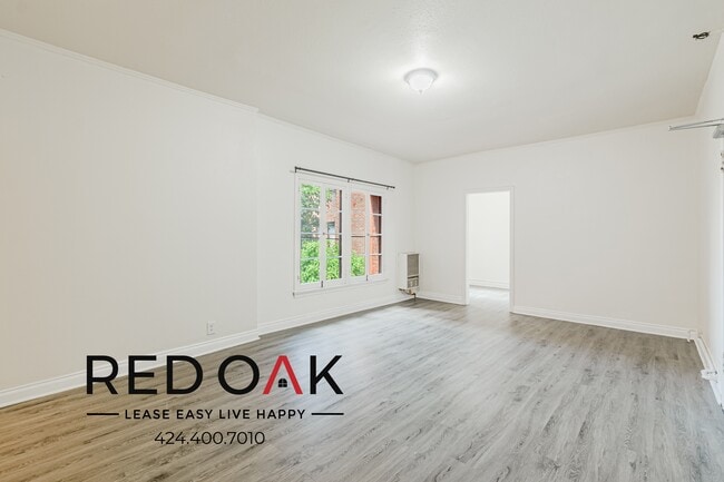 Building Photo - 5757 Franklin Ave Unit 310