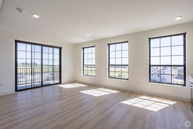 2BR, 2BA - 1,086SF - Living Room (No Fireplace) - The Lofts at Kettlestone Central