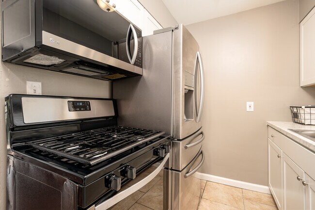 Remodeled Kitchen Range & Fridge - Lane Flats