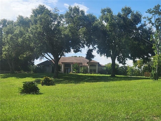 Building Photo - 15404 Thoroughbred Ln Rental