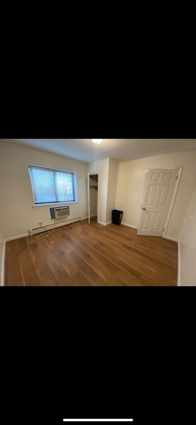 Photo - 73-26 Queens Midtown Expy Unit 1FL