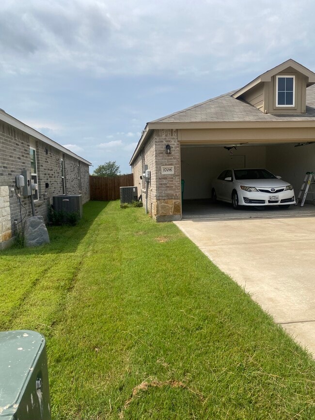 L. Side View of House - 1708 Village Creek Ln