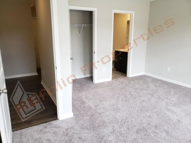 Photo - Beautiful Luxury 3 Story 3 Bedroom Townhome with 1st Floor Guest Suite, Attached 2 Car Garage, Co...