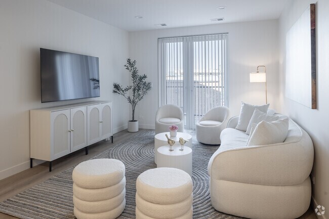 2Br, 2BA - 1,461SF - Living Room - The Grandstone by Nea Maya