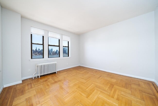 Building Photo - 883 JFK Blvd E Unit 2G