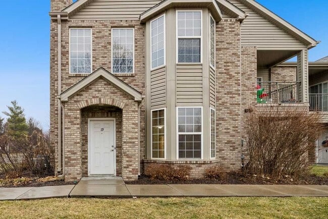 Welcoming entrances and classic brick exteriors create a warm first impression that makes coming home feel easy at the end of the day. - Stone Ridge Estates Apartments & Duplexes