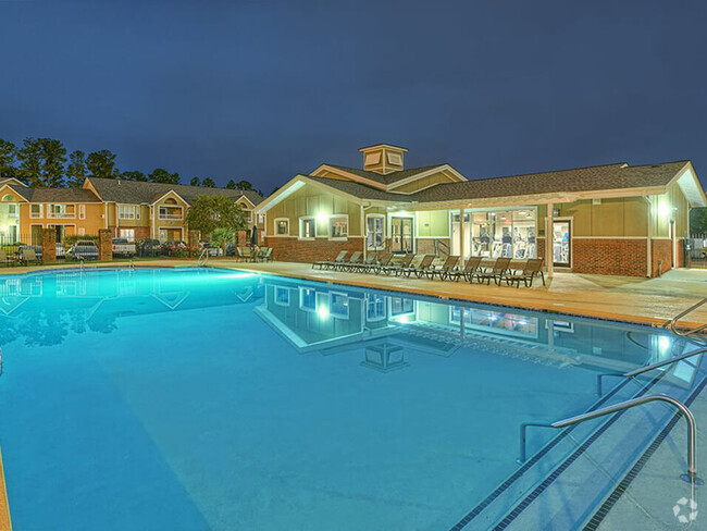 Relax at the clubhouse pool. - The Madison Rental