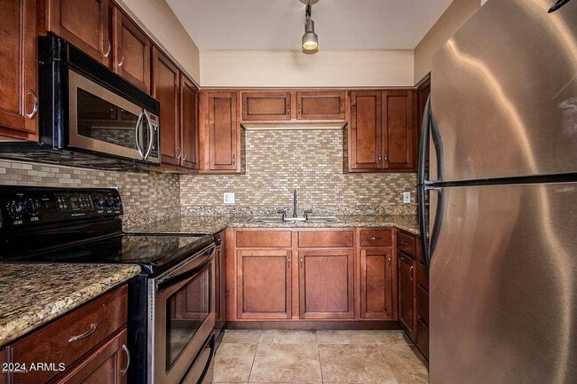 Photo - 1702 W Tuckey Ln Townhome