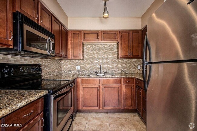 Building Photo - 1702 W Tuckey Ln Rental