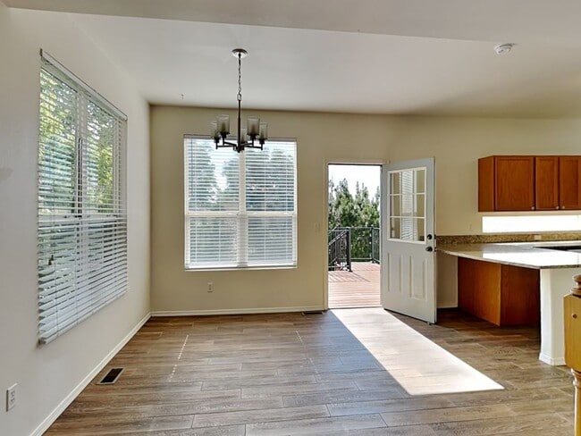 Photo - Single family home w/ 4 bedrooms, 3.5 baths, finished walkout basement!