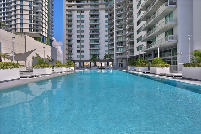 Photo - 690 SW 1st Ct Condominio