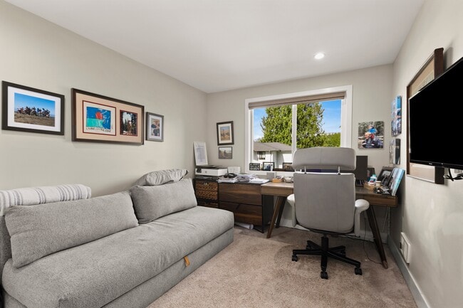 second bedroom/office with a queen sleeper sofaq - 280 NW Holly St Unit #6