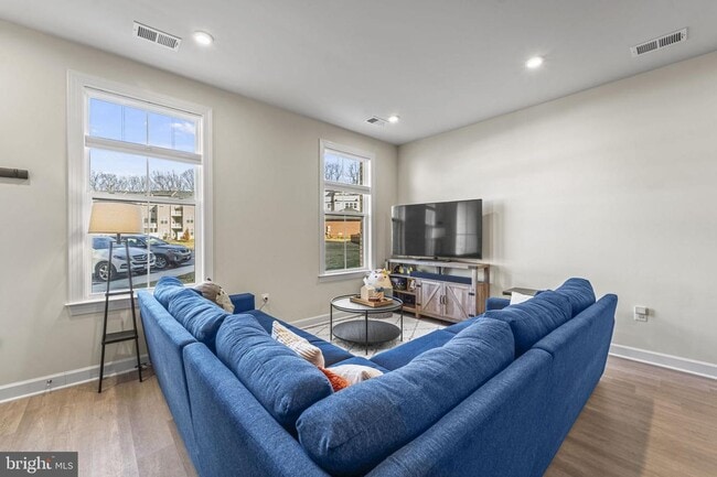 Photo - This beautiful 3 bed 2.5 bath 2-story condo provides a grand feeling with tall ceilings & over 16...