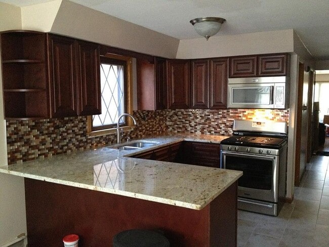 Building Photo - 6148 S Major Ave Unit 2