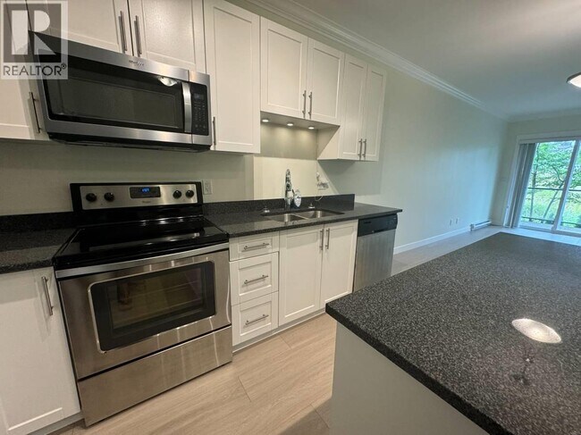 Photo - 11580-11223 223 St Unit 203