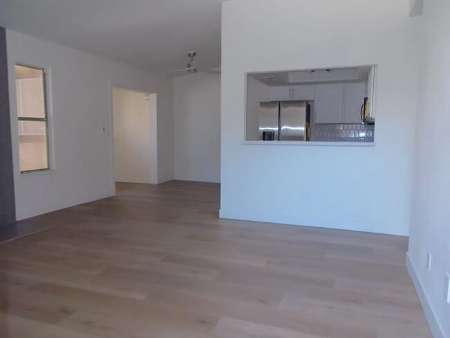 Photo - Elegant upstairs condo with modern upgrades and private balcony.