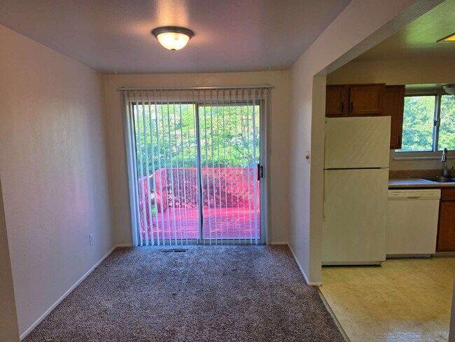 Photo - "Charming 3-Bed Retreat with Finished Basement & Cozy Fireplace in Aurora!"