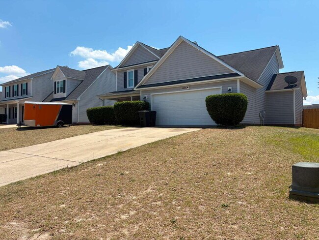 Photo - Spacious 4-Bedroom Sanctuary with Cozy Fireplace on Chimney Swift Drive!