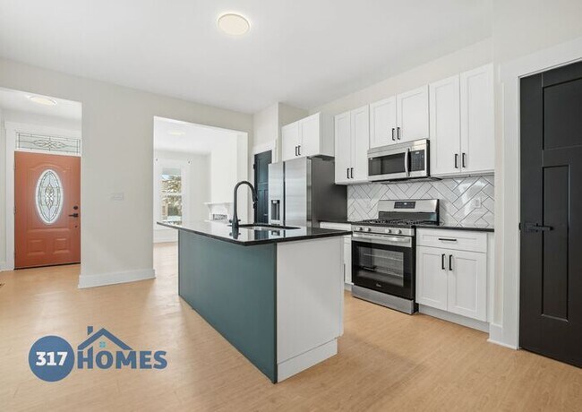 Photo - Spacious Four Bedroom Townhome with Main Level Suite in Holy Cross