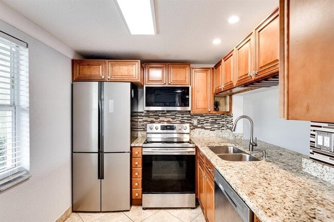 Photo - 9080 Lime Bay Blvd Unit 109