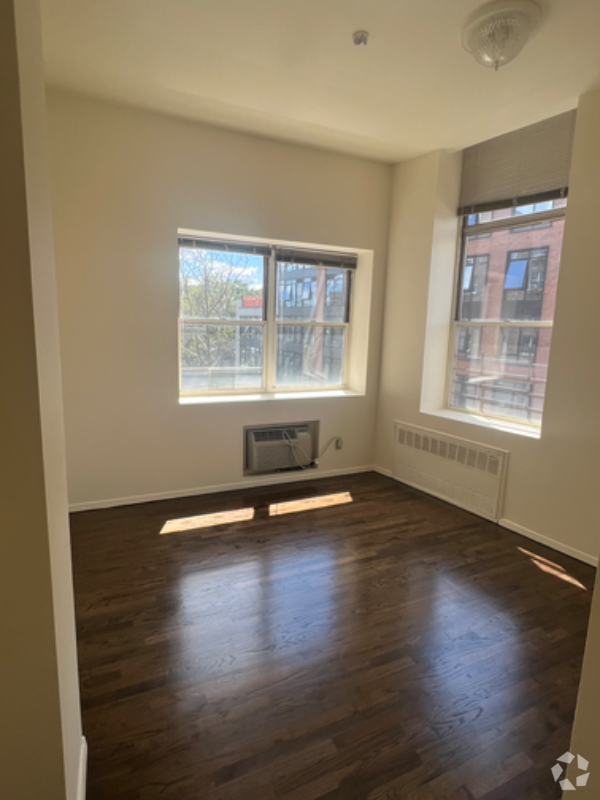 Building Photo - 61-20 Woodside Ave Unit 2F Rental