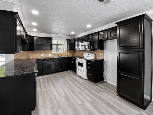 Photo - Freshly Renovated Home with HUGE backyard!