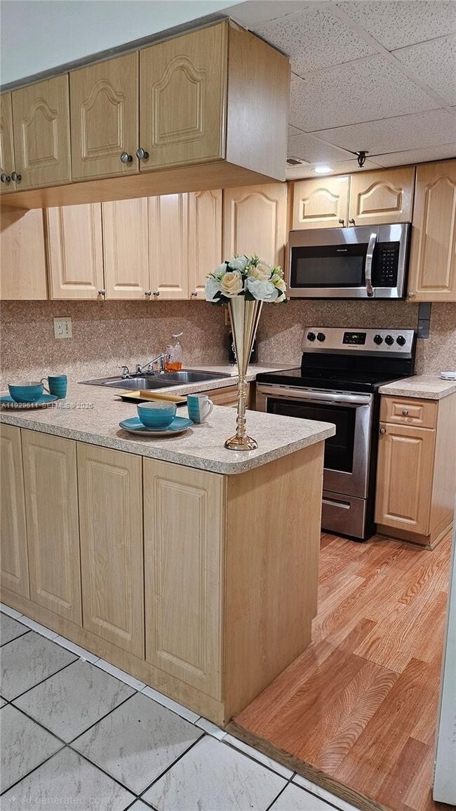 Building Photo - 10641 SW 108th Ave Unit THE PRADO