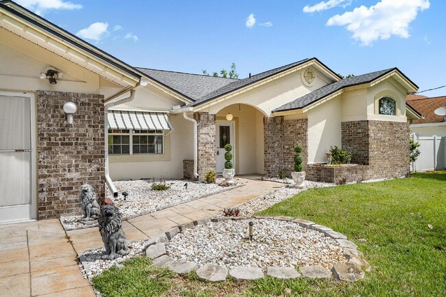 Building Photo - Spacious Pool Home in Desirable Palm Harbor – Pool Care Included