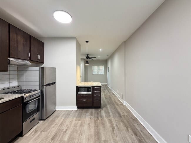 Building Photo - 4020 N Bell Ave Unit J08P