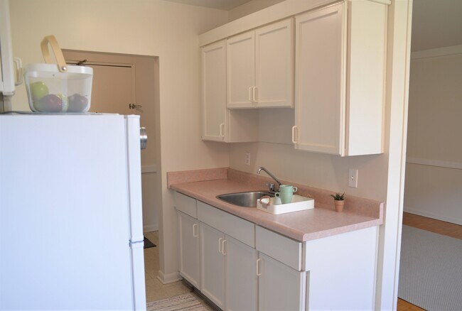 Efficient kitchen design with direct access to the entryway for convenience at 359 Edison. - 359 Edison Avenue