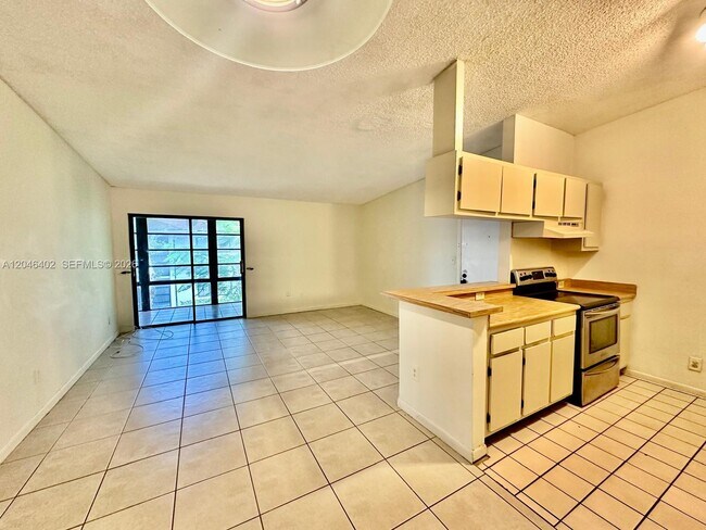 809 NE 199th St Unit 206-7