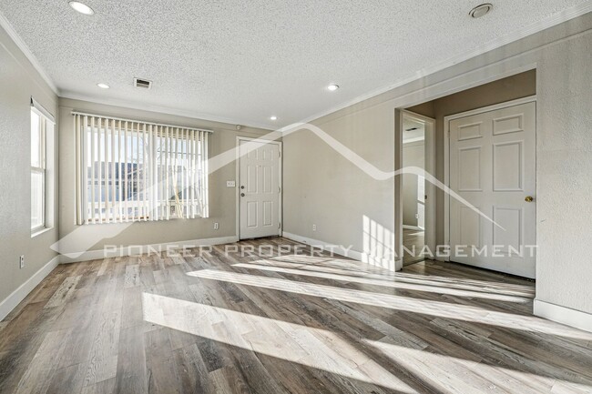 Photo - Spacious 3-Bedroom Home with Modern Features and Private Yard