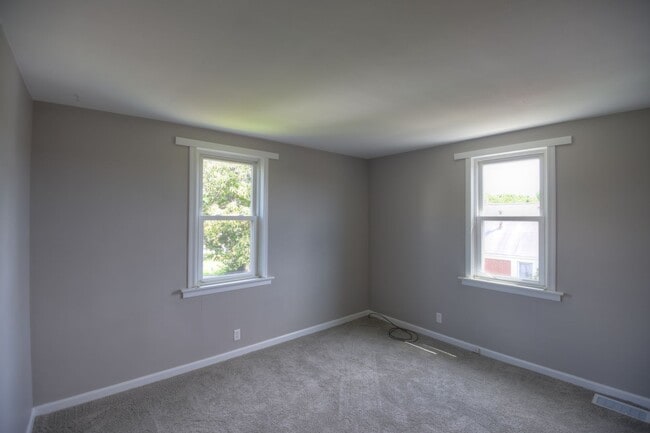 Photo - 2-Bedroom, 1-Bath Single-Family Home with Integral Garage and Renovated Interior for Rent