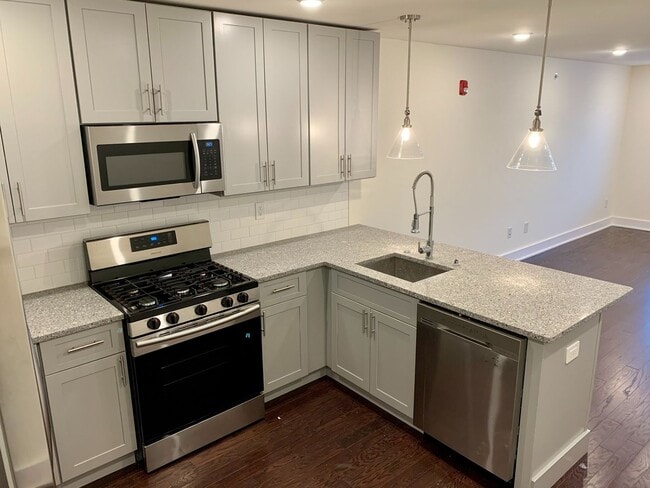 Photo - Stunning 2-Bed Condo with Private Roof Deck in Norris Square! Available mid-July! Unit 3